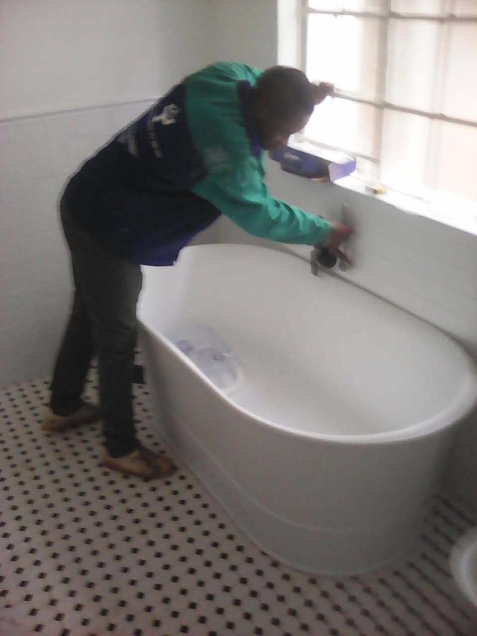 Fitting and leveling a new bath tub in Morningside, connecting the water supply and waste pipes, sealing edges, and testing for leaks to make sure it’s watertight and ready to use.